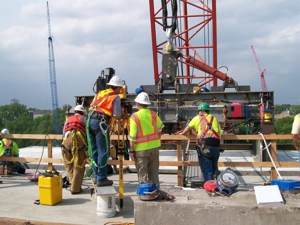 survey technicians working on Washington Ave bridge