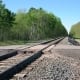 railroad tracks in a rural area