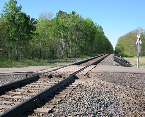 railroad tracks in a rural area